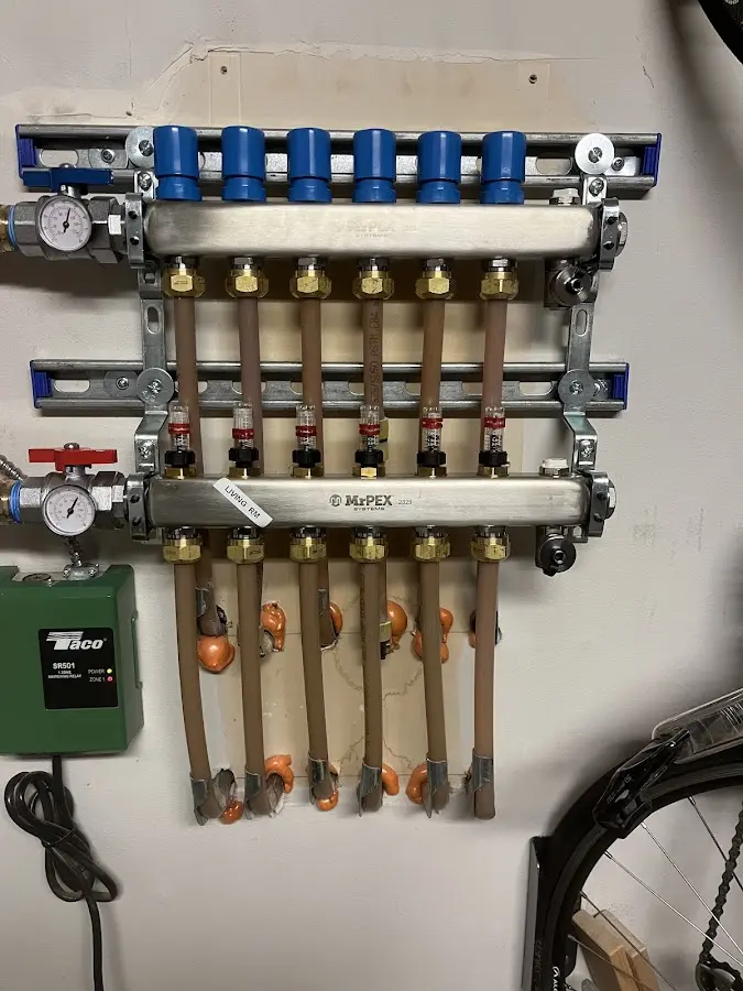 Plumber performing Water Heater Repair at a residential property in Hot Springs